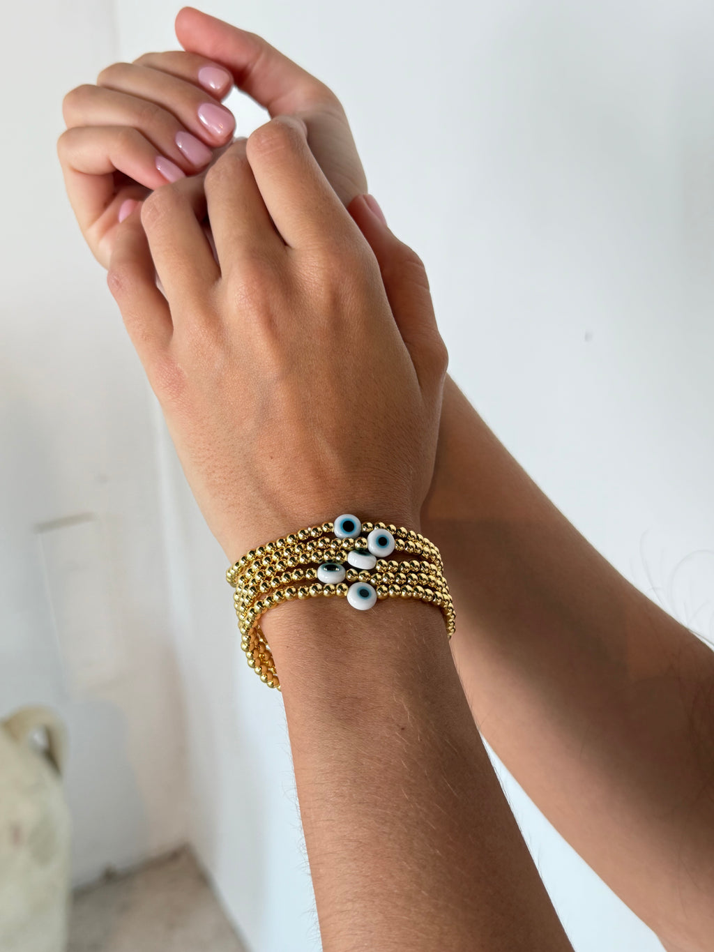 White Eye Gold Beaded Bracelet