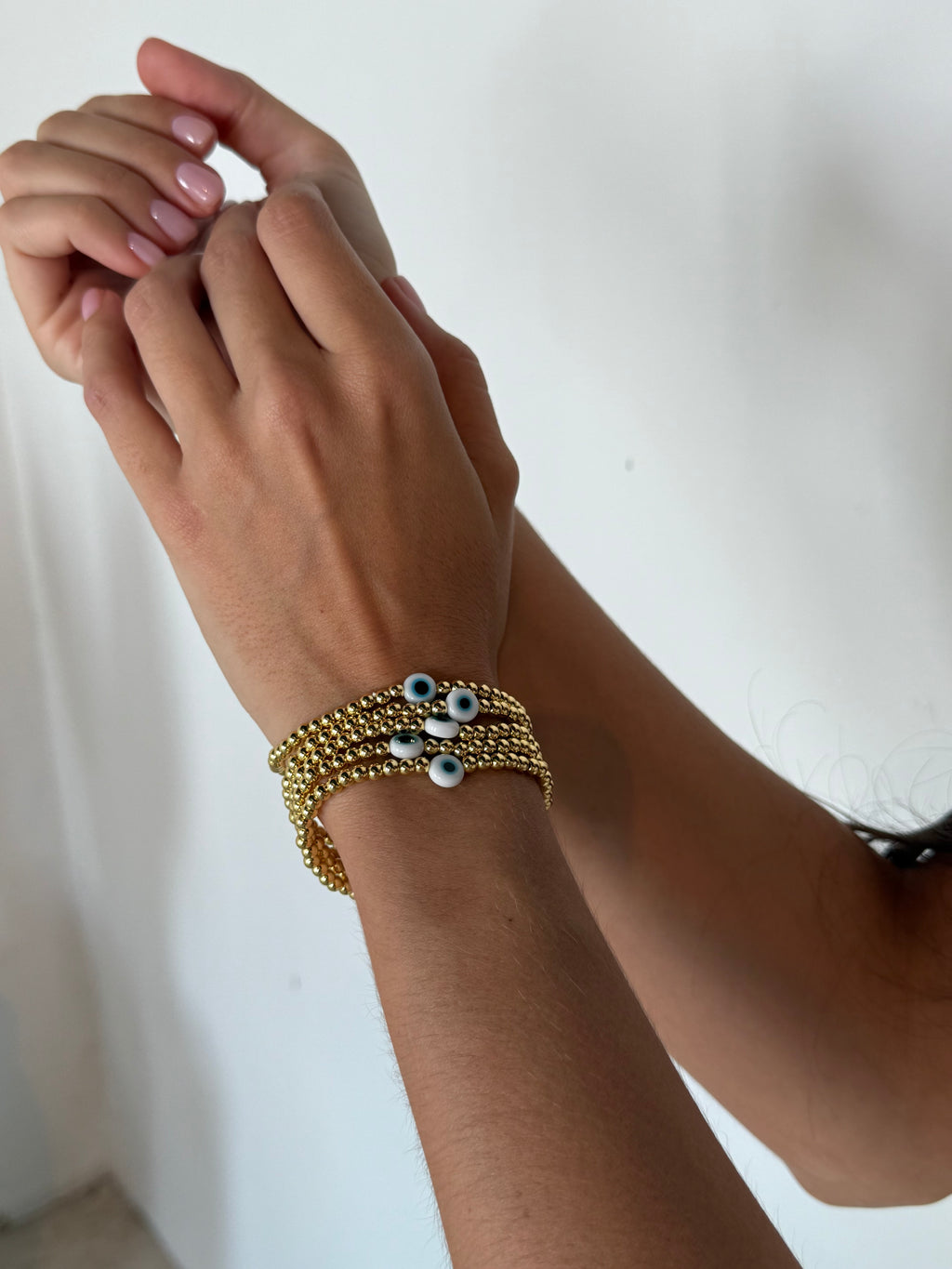 White Eye Gold Beaded Bracelet