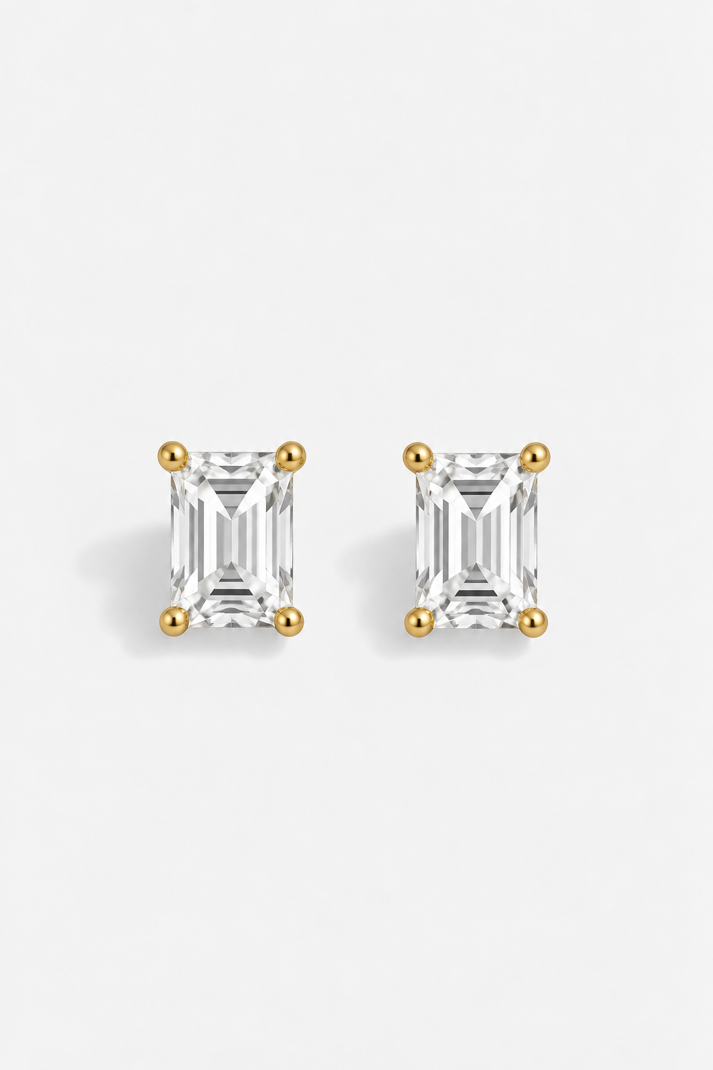 CLASSIC SOLITAIRE STUDS – EMERALD CUT